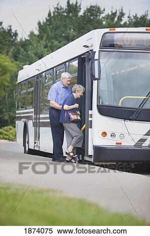 st. albert, alberta, canada; a senior couple getting on the city bus View Large Photo Image Stock Photography - st. albert, alberta, canada; a senior couple getting on the city bus. Fotosearch