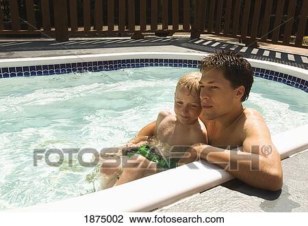 willmar, minnesota, united states of america; brother sitting together in a swimming pool View Large Photo Image Stock Image - willmar, minnesota, united states of america; brother sitting together in a swimming pool. Fotosearch