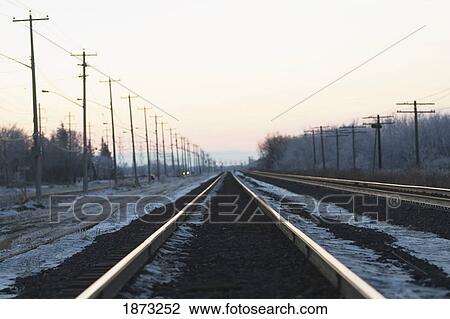 Stock Image - winnipeg, manitoba, canada; ice along the train tracks. Fotosearch
