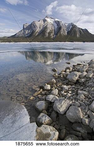 alberta, canada; reflection of a mountain in frozen abraham lake View Large Photo Image Stock Photography - alberta, canada; reflection of a mountain in frozen abraham lake. Fotosearch