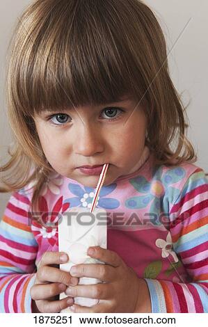 cadiz, spain; a young girl drinks from a straw View Large Photo Image Stock Image - cadiz, spain; a young girl drinks from a straw. Fotosearch
