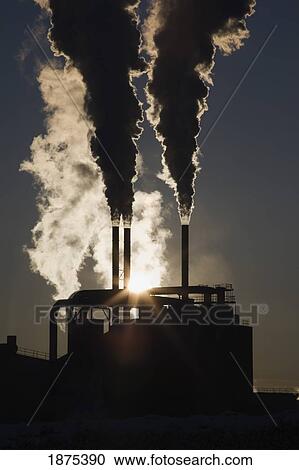 edson, alberta, canada; silhouette of smoke stacks with steam and a sunburst View Large Photo Image Stock Image - edson, alberta, canada; silhouette of smoke stacks with steam and a sunburst. Fotosearch