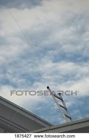 kuala lumpur, malaysia; a metal ladder on a roof reaching to the sky View Large Photo Image Stock Photo - kuala lumpur, malaysia; a metal ladder on a roof reaching to the sky. Fotosearch