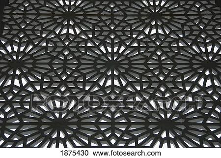 Stock Image - kuala lumpur, malaysia; an ornate metal design as part of a building. Fotosearch