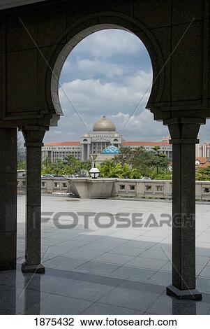 kuala lumpur, malaysia; view of a building through an archway and columns View Large Photo Image Stock Image - kuala lumpur, malaysia; view of a building through an archway and columns. Fotosearch