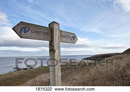 northumberland, england; a wooden sign post for the coast path along the shoreline View Large Photo Image Stock Image - northumberland, england; a wooden sign post for the coast path along the shoreline. Fotosearch