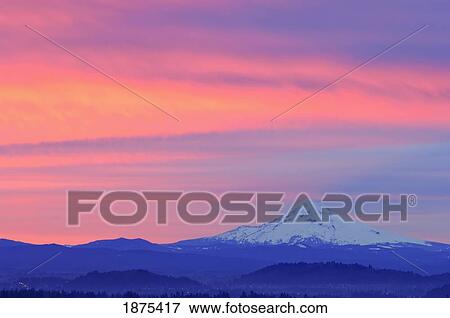 Stock Photo - oregon, united states of america; a red sunrise over mount hood. Fotosearch