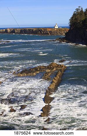 Picture - oregon, united states of america; cape arago lighthouse at shore acres state park along the coast of the pacific ocean. Fotosearch
