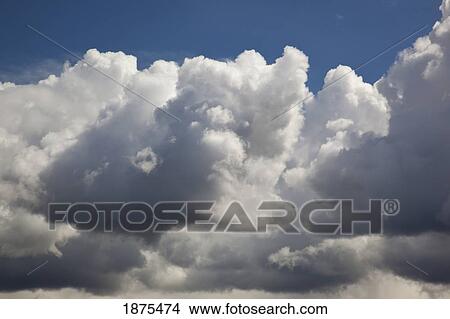Picture - oregon, united states of america; dark cumulus clouds in the sky. Fotosearch