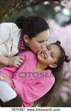 portland, oregon, united states of america; girls playing under a cherry blossom tree View Large Photo Image Stock Photo - portland, oregon, united states of america; girls playing under a cherry blossom tree. Fotosearch
