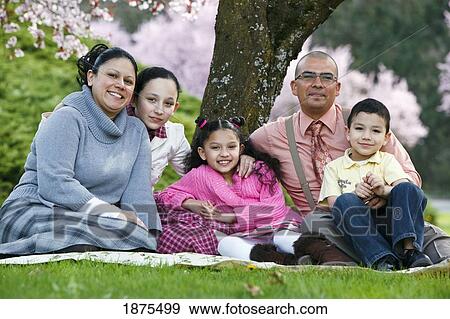 portland, oregon, united states of america; family sitting under a cherry blossom tree View Large Photo Image Stock Photo - portland, oregon, united states of america; family sitting under a cherry blossom tree. Fotosearch
