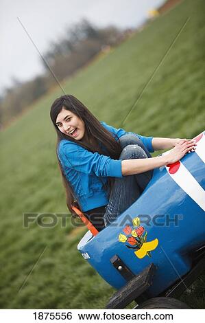woodburn, oregon, united states of america; a girl sitting in a painted wooden shoe at the wooden shoe tulip farm View Large Photo Image Stock Photograph - woodburn, oregon, united states of america; a girl sitting in a painted wooden shoe at the wooden shoe tulip farm. Fotosearch
