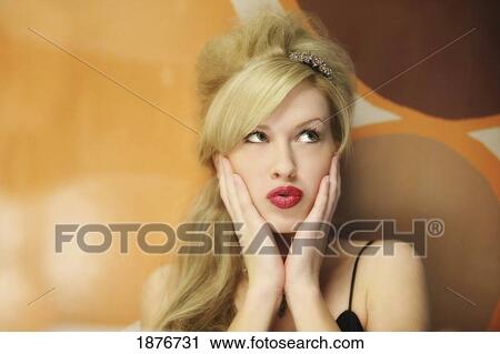 A Glamorous Woman With Long Blond Hair View Large Photo Image Stock Image - A Glamorous Woman With Long Blond Hair. Fotosearch