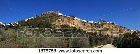 Arcos De La Frontera, Cadiz, Andalusia, Spain; The Old Town On A Hill View Large Photo Image Stock Photo - Arcos De La Frontera, Cadiz, Andalusia, Spain; The Old Town On A Hill. Fotosearch