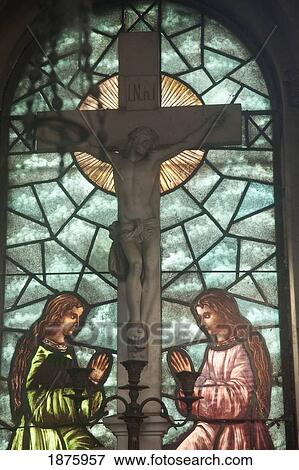 Buenos Aires, Argentina; A Stained Glass Window Depicting Two Women Kneeling At The Cross In Recoleta Cemetery View Large Photo Image Stock Photo - Buenos Aires, Argentina; A Stained Glass Window Depicting Two Women Kneeling At The Cross In Recoleta Cemetery. Fotosearch