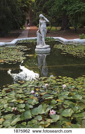 Buenos Aires, Argentina; A Stone Statue In A Pond In The Palermo Botanical Gardens (Jardin Botanical) View Large Photo Image Stock Image - Buenos Aires, Argentina; A Stone Statue In A Pond In The Palermo Botanical Gardens (Jardin Botanical). Fotosearch