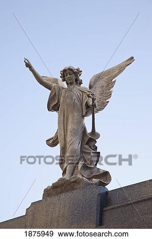 Stock Photo - Buenos Aires, Argentina; A Stone Statue Of An Angel In Recoleta Cemetery. Fotosearch