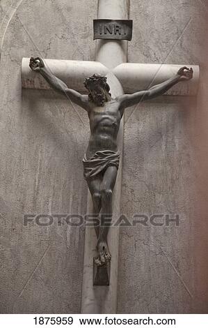 Stock Photo - Buenos Aires, Argentina; Statue Of Jesus On A Cross In Recoleta Cemetery. Fotosearch