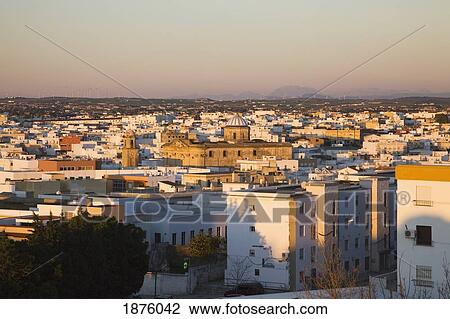 Stock Image - Chiclana, Andalusia, Spain; A View Of The City At Sunset. Fotosearch