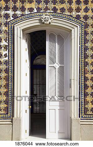 Picture - Chiclana, Andalusia, Spain; A White Door In A Colorful Wall. Fotosearch