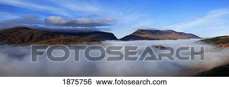 Stock Photograph - County Kerry, Ireland; Mist In Molls Gap Near Killarney. Fotosearch