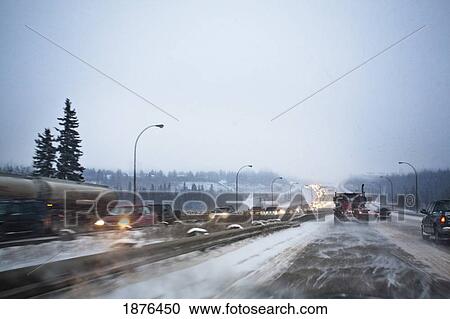 Edmonton, Alberta, Canada; Vehicles Traveling On The Road With Snow Blowing In Winter View Large Photo Image Stock Image - Edmonton, Alberta, Canada; Vehicles Traveling On The Road With Snow Blowing In Winter. Fotosearch