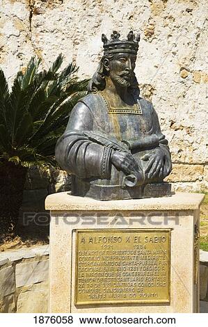Stock Photo - El Puerto De Santa Maria, Andalusia, Spain; A Statue Of Alfonso X El Sabio. Fotosearch