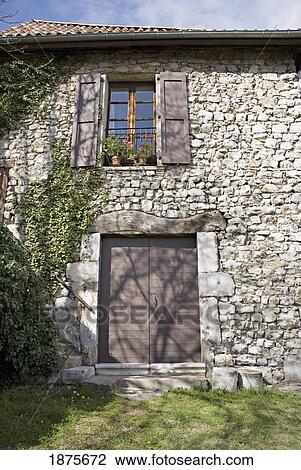 Stock Image - Grenoble, Isère, France; Stone Facade Of An Old European House. Fotosearch