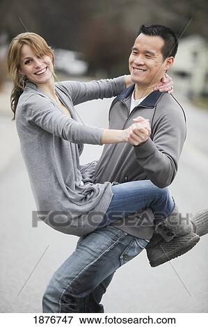 Jordan, Ontario, Canada; A Couple Being Playful View Large Photo Image Stock Photo - Jordan, Ontario, Canada; A Couple Being Playful. Fotosearch