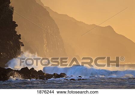 Picture - Kauai, Hawaii, United States Of America; Ocean Waves Crash Against Cliffs On The Rugged Na Pali Coast. Fotosearch