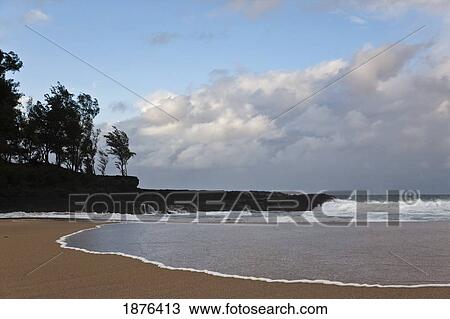 Kauai, Hawaii, United States Of America; Breaking Wave Washes Over Sand At Lumahai Beach View Large Photo Image Stock Image - Kauai, Hawaii, United States Of America; Breaking Wave Washes Over Sand At Lumahai Beach. Fotosearch