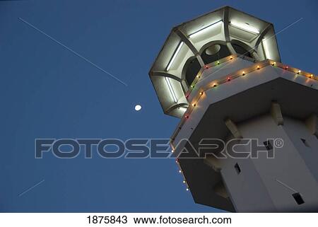 Kuala Lumpur, Malaysia; View Of An Illuminated Tall Building From A Low Angle View Large Photo Image Stock Image - Kuala Lumpur, Malaysia; View Of An Illuminated Tall Building From A Low Angle. Fotosearch