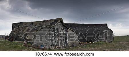 Picture - Lindisfarne, Northumberland, England; Two Old Wooden Buildings On Holy Island. Fotosearch