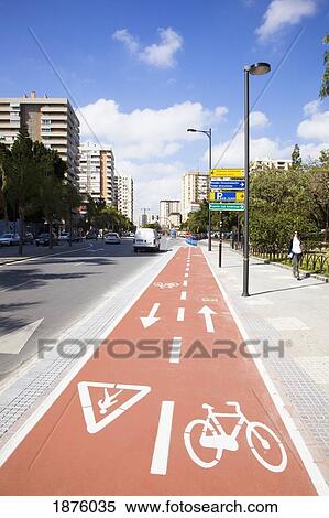 Stock Photography - Malaga, Andalusia, Spain; The Streets With A Sidewalk Marked For Pedestrians And Cyclists. Fotosearch