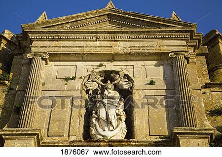 Stock Photo - Medina Sidonia, Andalusia, Spain; A Stone Statue At The Iglesia Mayor. Fotosearch