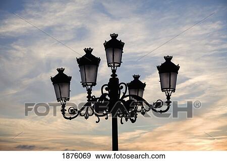 Stock Photo - Medina Sidonia, Andalusia, Spain; A Light Post With 5 Lamps On It. Fotosearch