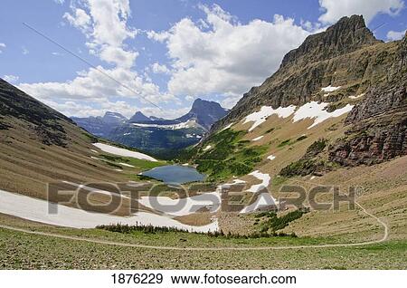 Montana, United States Of America; View From Ptarmigan Pass In Glacier National Park View Large Photo Image Stock Photo - Montana, United States Of America; View From Ptarmigan Pass In Glacier National Park. Fotosearch