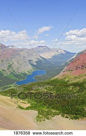 Montana, United States Of America; View From Ptarmigan Pass In Glacier National Park View Large Photo Image Stock Photo - Montana, United States Of America; View From Ptarmigan Pass In Glacier National Park. Fotosearch