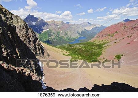Montana, United States Of America; View From Ptarmigan Pass In Glacier National Park View Large Photo Image Stock Photo - Montana, United States Of America; View From Ptarmigan Pass In Glacier National Park. Fotosearch