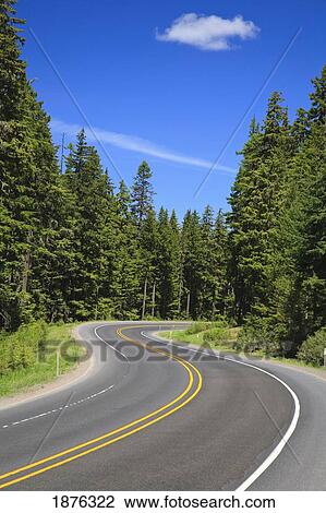 Stock Image - Oregon, United States Of America; A Road Winding Through The Columbia River Gorge National Scenic Area. Fotosearch