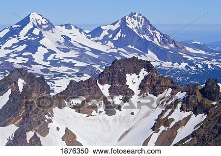 Stock Image - Oregon, United States Of America; Aerial View Of Broken Top And Three Sister Mountain Range. Fotosearch