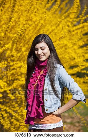 Portland, Oregon, United States Of America; A Teenage Girl Poses In Front Of A Tree With Autumn Colors In Portland Park View Large Photo Image Stock Image - Portland, Oregon, United States Of America; A Teenage Girl Poses In Front Of A Tree With Autumn Colors In Portland Park. Fotosearch