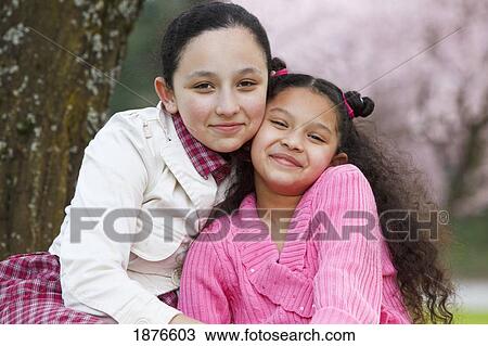 Portland, Oregon, United States Of America; Two Sisters In Westmorland Park View Large Photo Image Stock Image - Portland, Oregon, United States Of America; Two Sisters In Westmorland Park. Fotosearch
