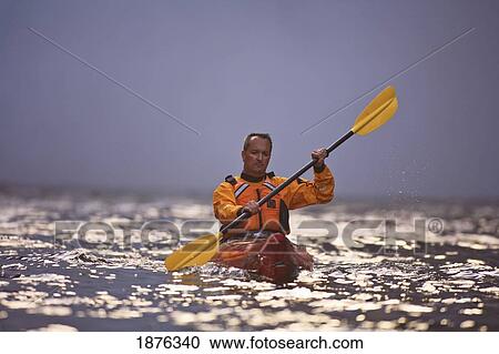 Stock Image - Snoqualmie, Washington, United States Of America; A Man Kayaking Near Snoqualmie Falls. Fotosearch