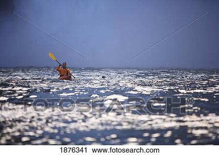 Stock Image - Snoqualmie, Washington, United States Of America; A Man Kayaking Near Snoqualmie Falls. Fotosearch