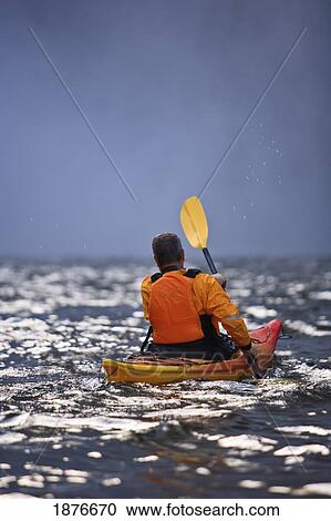 Stock Image - Washington, United States Of America; A Man Kayaking Near Snoqualmie Falls. Fotosearch