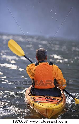 Stock Photo - Washington, United States Of America; A Man Kayaking Near Snoqualmie Falls. Fotosearch