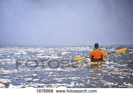 Stock Photo - Washington, United States Of America; A Man Kayaking Near Snoqualmie Falls. Fotosearch