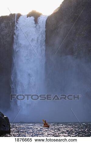 Stock Photography - Washington, United States Of America; A Man Kayaking Near Snoqualmie Falls. Fotosearch