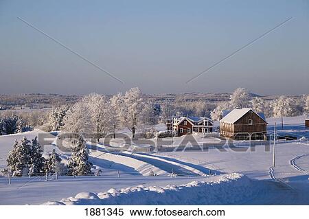 Stock Photography - a barn and house in winter; iron hill, quebec, canada. Fotosearch